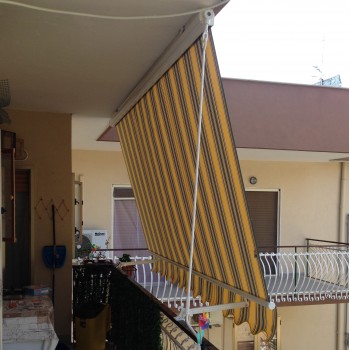 Tenda da sole a caduta economica 2000